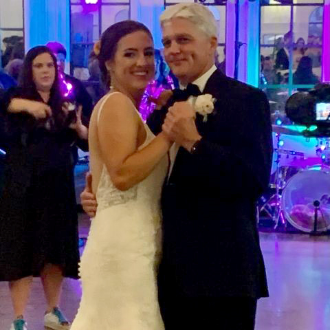 Jimmy dancing with his daughter Emily at her wedding