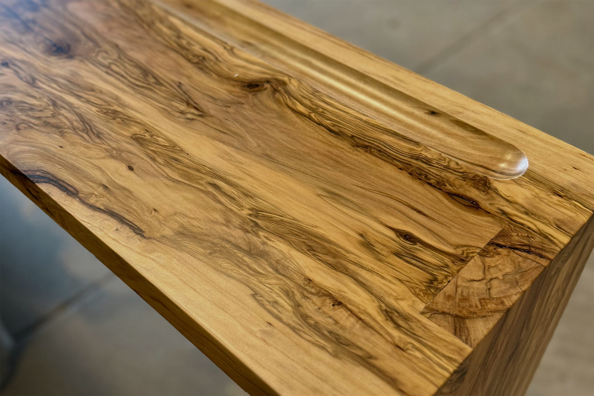 Alabama Sawyer creates beautiful custom wood furniture from reclaimed urban timber.